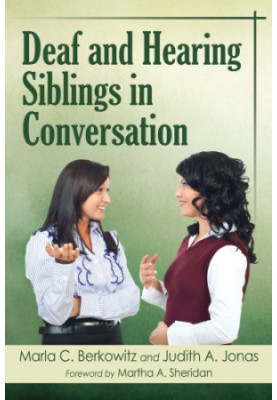 Deaf and hearing siblings in conversation